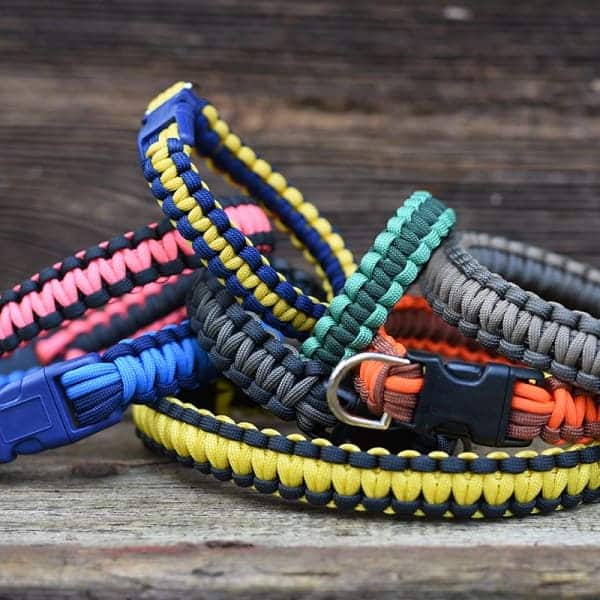 multicolored paracord collars stacked upon one another