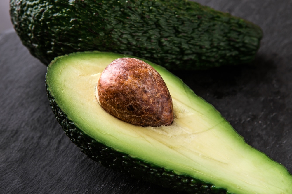 A closeup view of an avocado pit